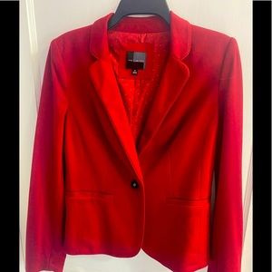 Red blazer like new and a color is perfect red
